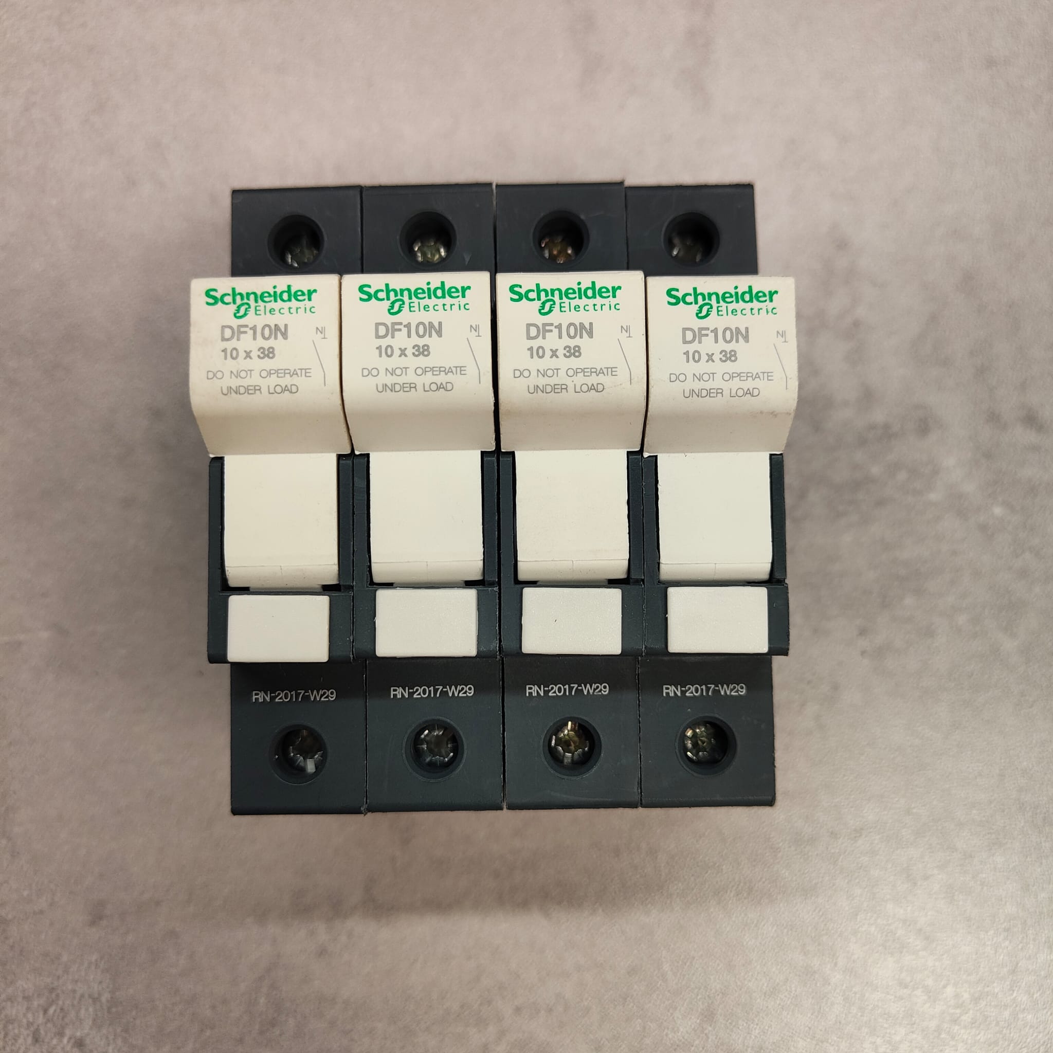 Lot de 4 porte-fusibles neutres Schneider Electric TeSys DF10N – 32 A – 10×38 mm